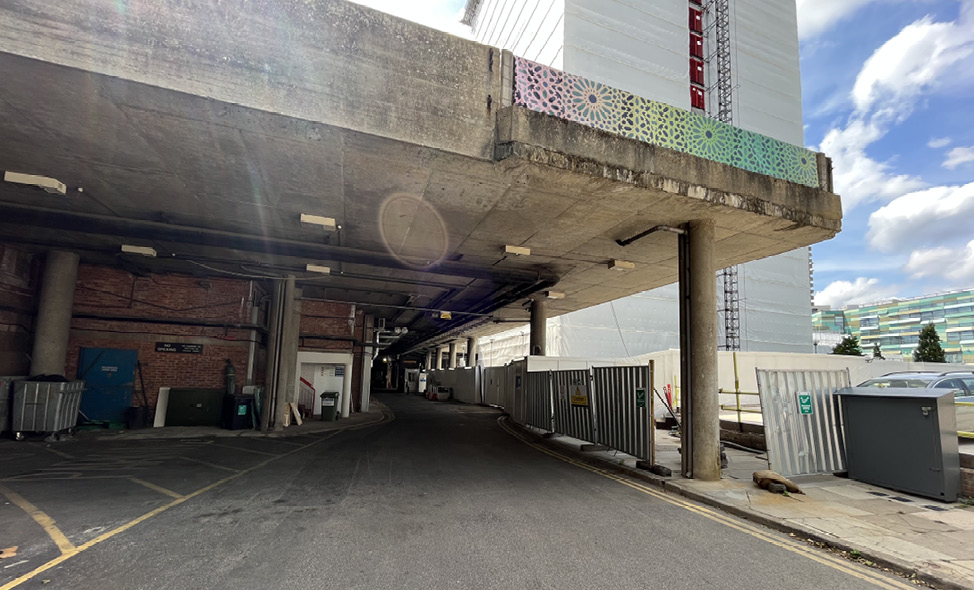 Covered service road on the southern boundary of the memorial site